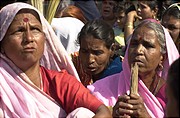 Victims of the Bhopal disaster protest outside Dow\'s headquarters in Bombay. Dow wants US$10,000 compensation from the survivors for this peaceful protest.