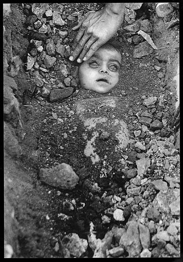 Burial of an unknown child victim of the Bhopal disaster.